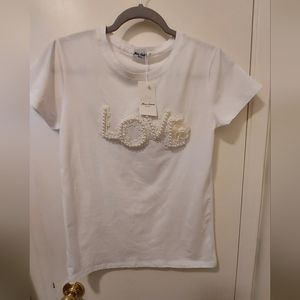 Brand new white Miss Charm Paris Love shirt L/XL. Embellished lace/pearl letters